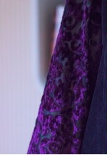 Black suede like dress with purple velour sleeves